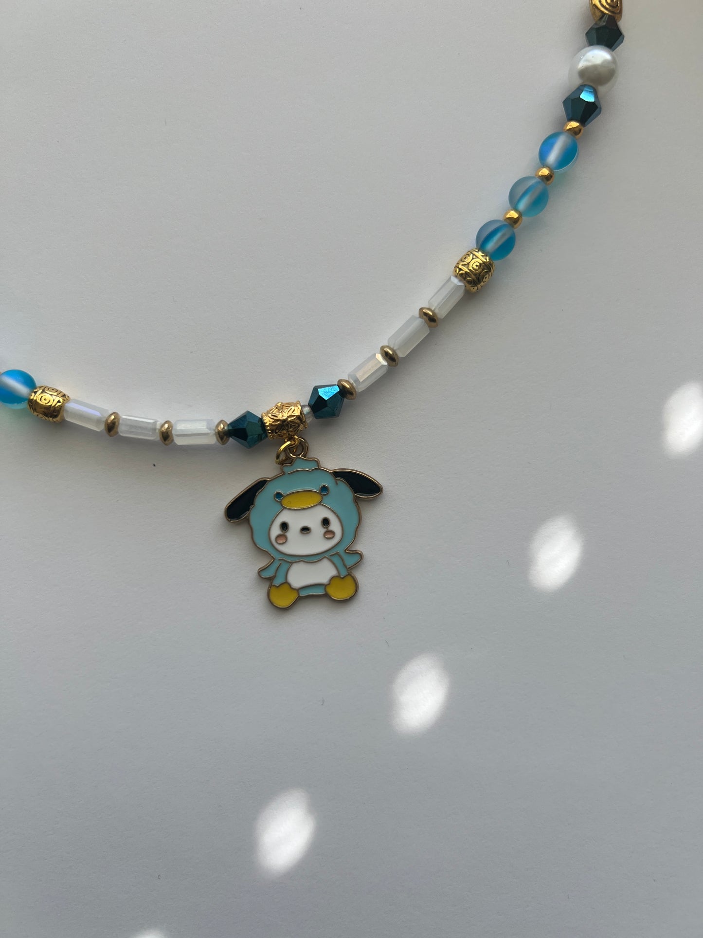 Pochacco in Blue Necklace | Whimsical Elegance & Playful Charm